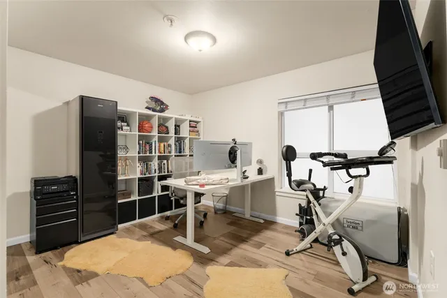 a view of a workspace with furniture