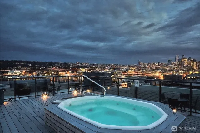 a view of a swimming pool with a lounge chairs