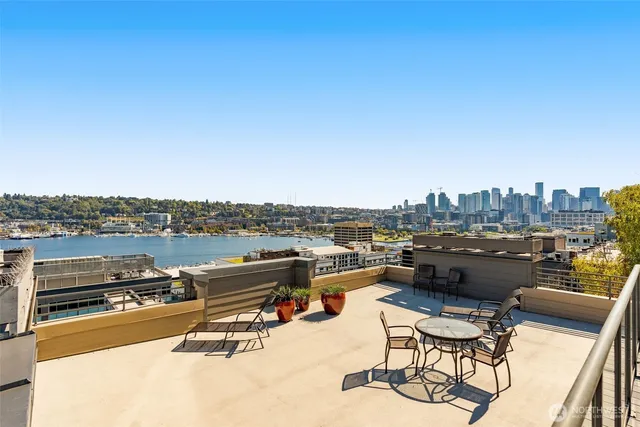 a view of a terrace with seating area