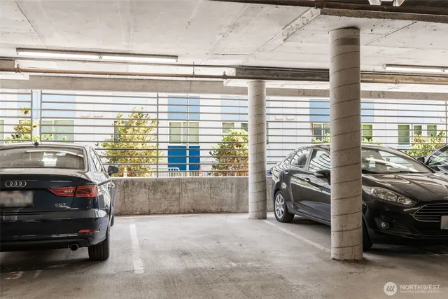 a view of a car park in front of a house