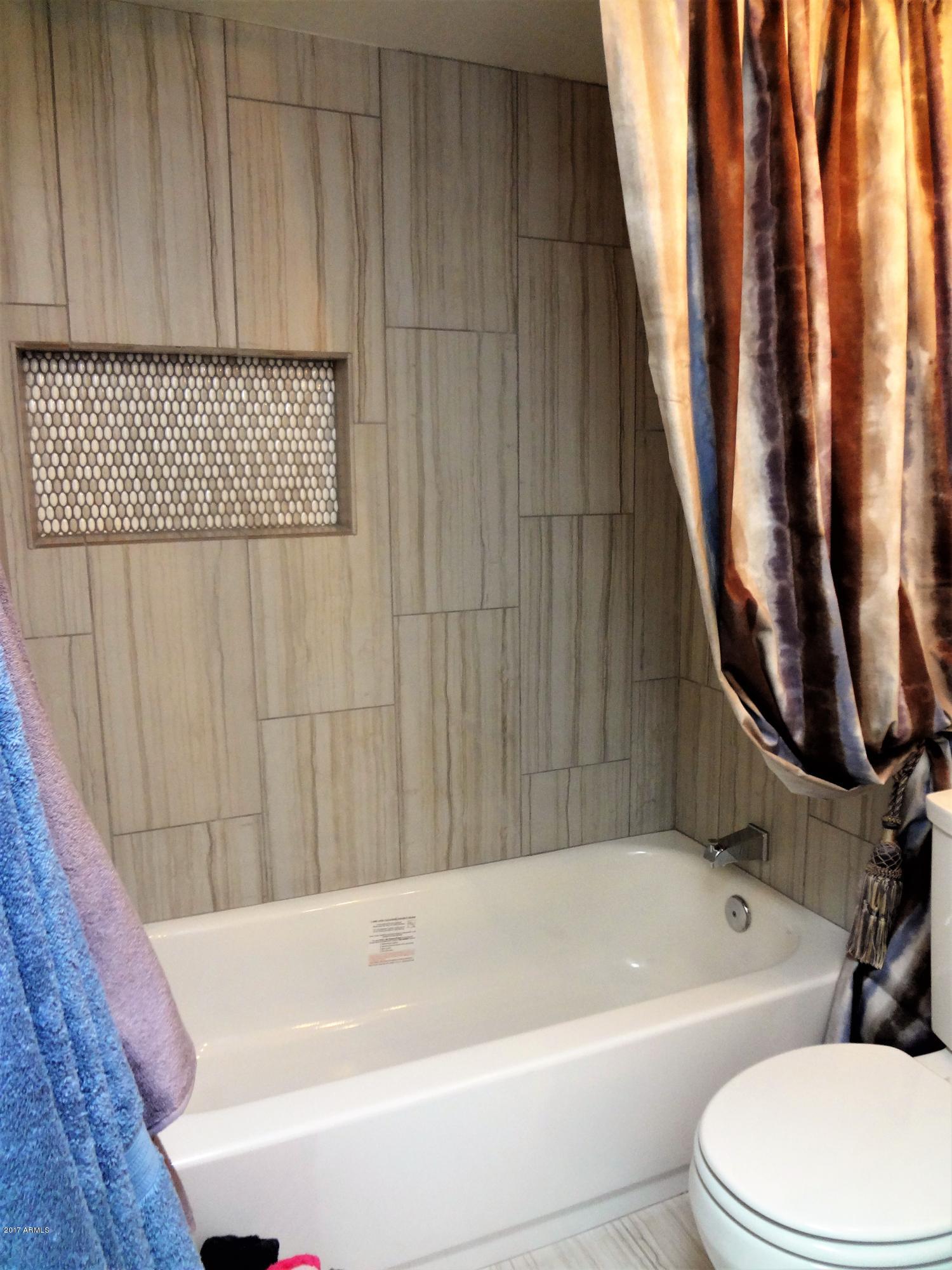 6003 North 10th Way Phoenix, AZ 85014 - Photo 21 of 37 New Tile in Showers & Floors