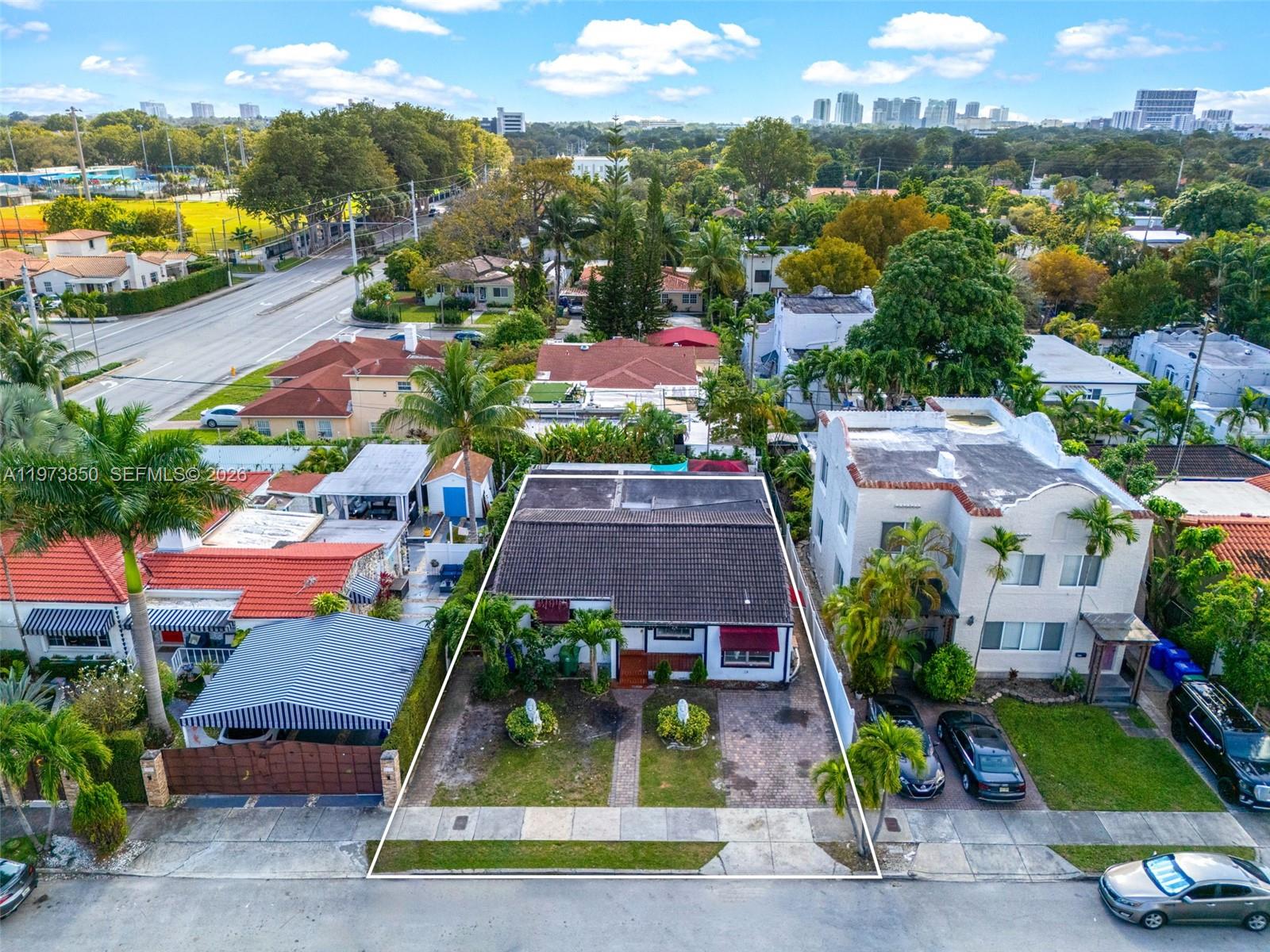 2220 Southwest 16th Terrace Miami, FL 33145 - Photo 5 of 12 an aerial view of residential houses with outdoor space and ocean view