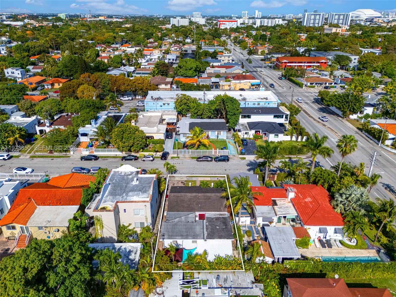 2220 Southwest 16th Terrace Miami, FL 33145 - Photo 8 of 12 an aerial view of residential houses with outdoor space