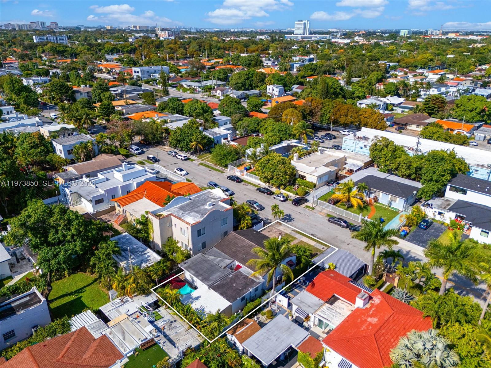 2220 Southwest 16th Terrace Miami, FL 33145 - Photo 9 of 12 an aerial view of residential houses with outdoor space