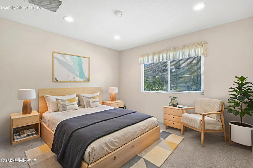 5339 Seneca Place Simi Valley, CA 93063 - Photo 50 of 76 a bedroom with a large bed and a window
