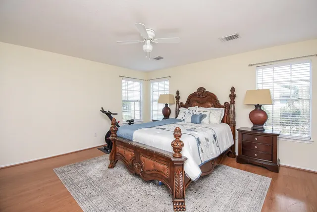 a bed room with a bed and window