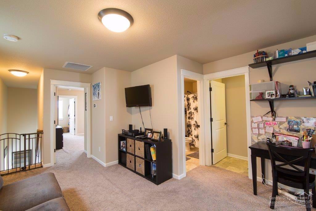 20244 Badger Road Bend, OR 97702 - Photo 12 of 25 From the family room, the master is to t