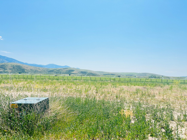 3 Stringtown, Unit 3 Georgetown, ID 83239 - Photo 1 of 1 Mountain view featuring a rural view