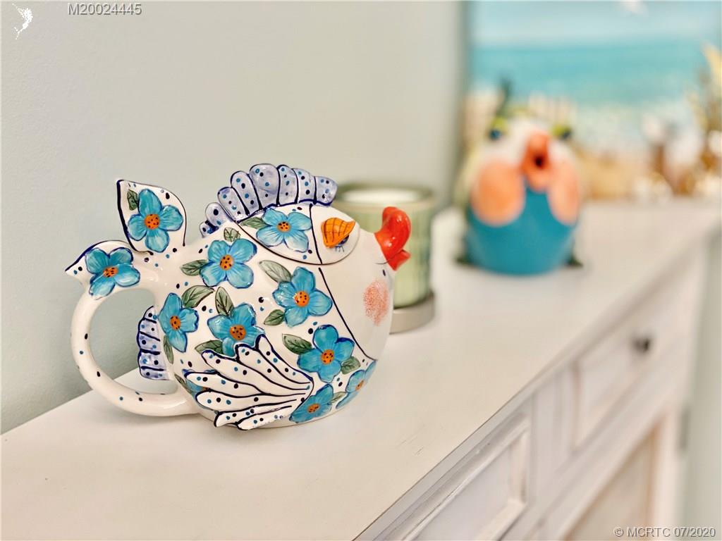 2198 Southwest Mainsail Terrace Stuart, FL 34997 - Photo 19 of 68 a view of a vase of flowers