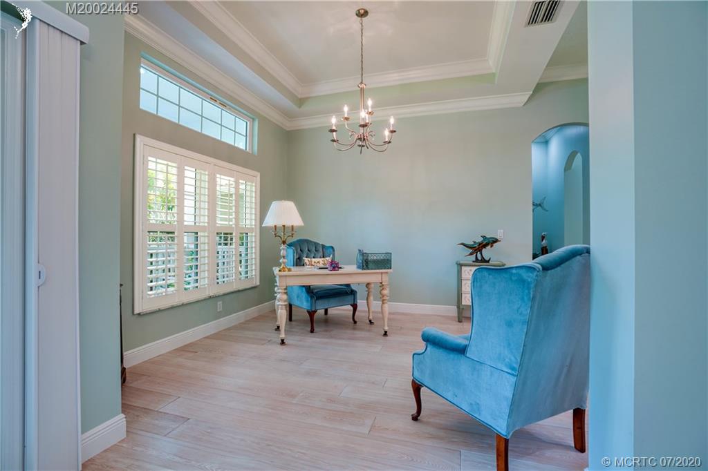 2198 Southwest Mainsail Terrace Stuart, FL 34997 - Photo 20 of 68 a view of living room filled with furniture and a window