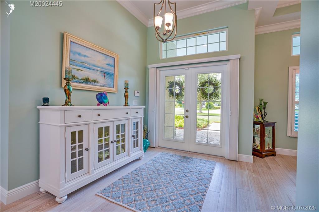 2198 Southwest Mainsail Terrace Stuart, FL 34997 - Photo 29 of 68 a view of an entryway with wooden floor