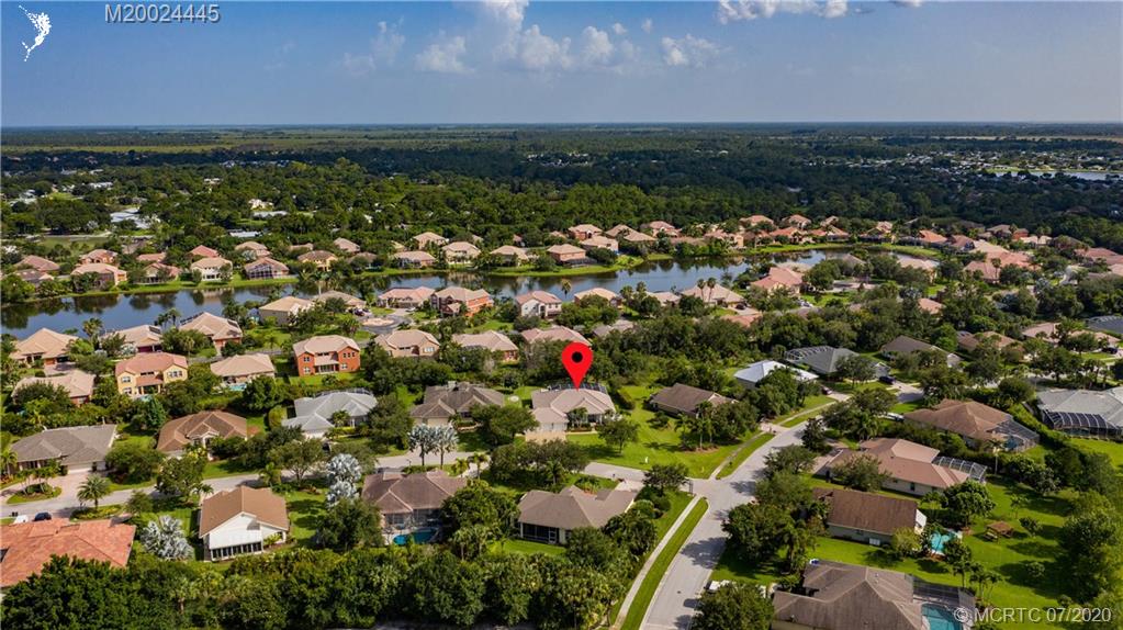 2198 Southwest Mainsail Terrace Stuart, FL 34997 - Photo 5 of 68 an aerial view of a city