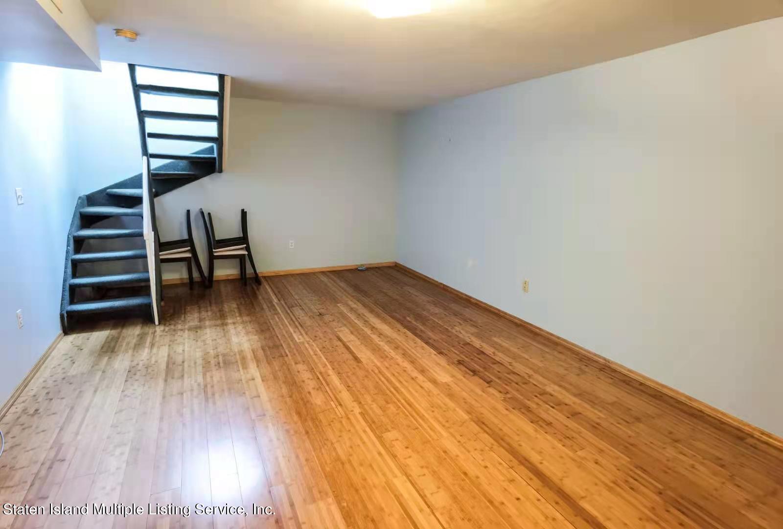 44 Chesebrough Street Staten Island, NY 10312 - Photo 15 of 24 wooden floor in an empty room