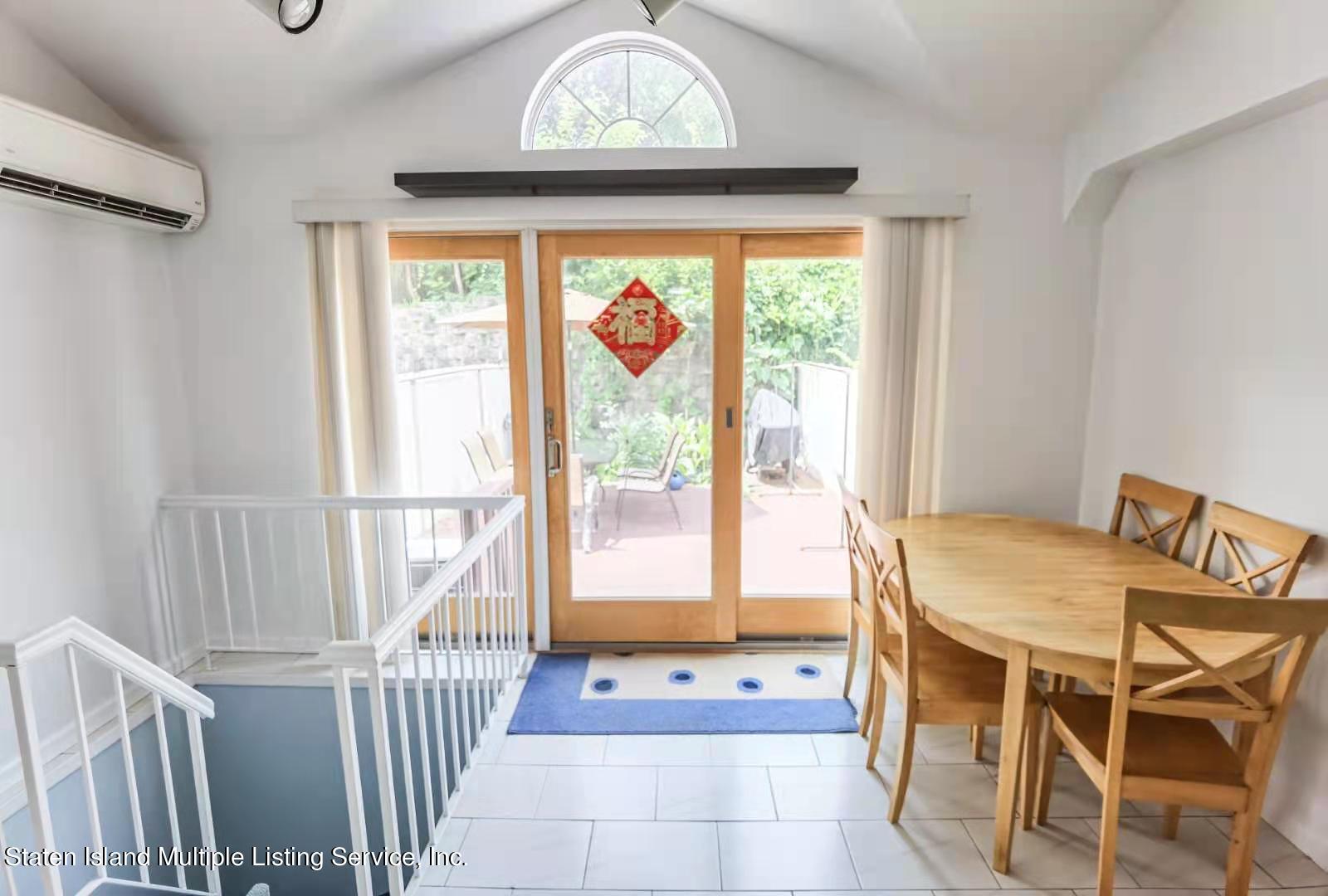 44 Chesebrough Street Staten Island, NY 10312 - Photo 16 of 24 a dining room with furniture and a window