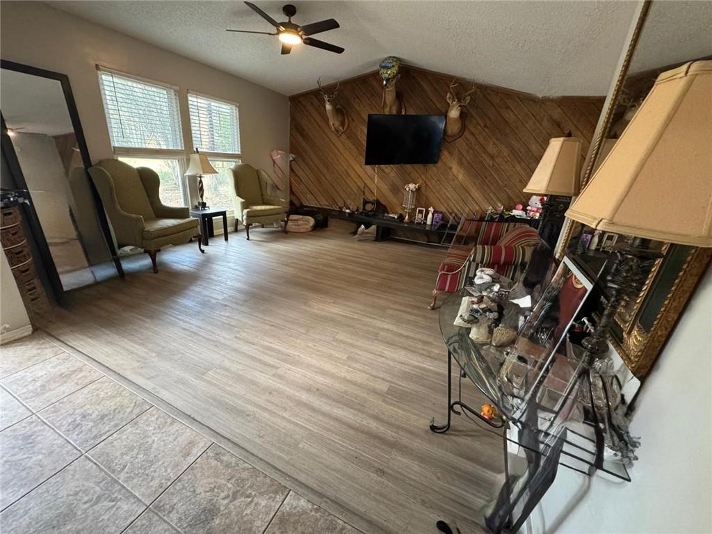 5298 Miller Road Southwest Lilburn, GA 30047 - Photo 3 of 6 a living room with furniture and a flat screen tv