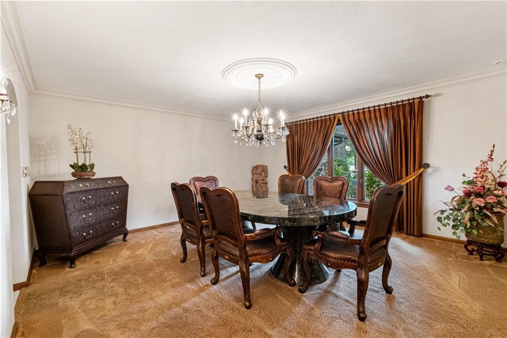 46 Cheslock Road Canonsburg, PA 15317 - Photo 12 of 24 a view of a dining room with furniture and chandelier