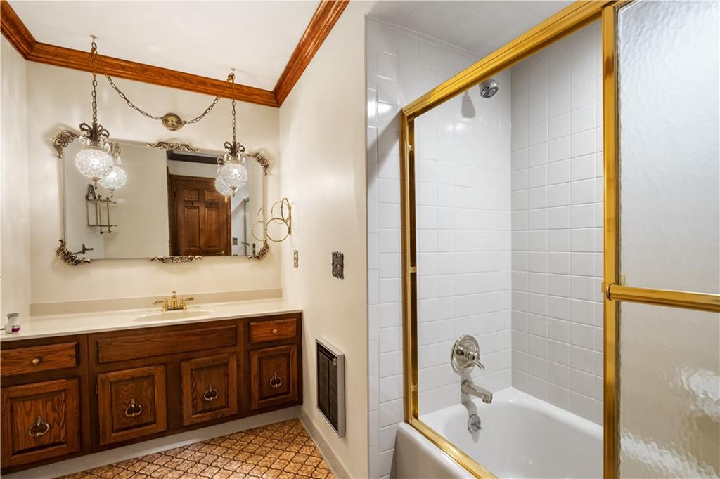 46 Cheslock Road Canonsburg, PA 15317 - Photo 19 of 24 a bathroom with a tub sink and mirror