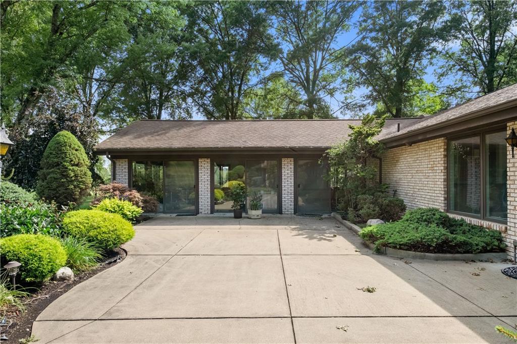 46 Cheslock Road Canonsburg, PA 15317 - Photo 22 of 24 a front view of a house with garden