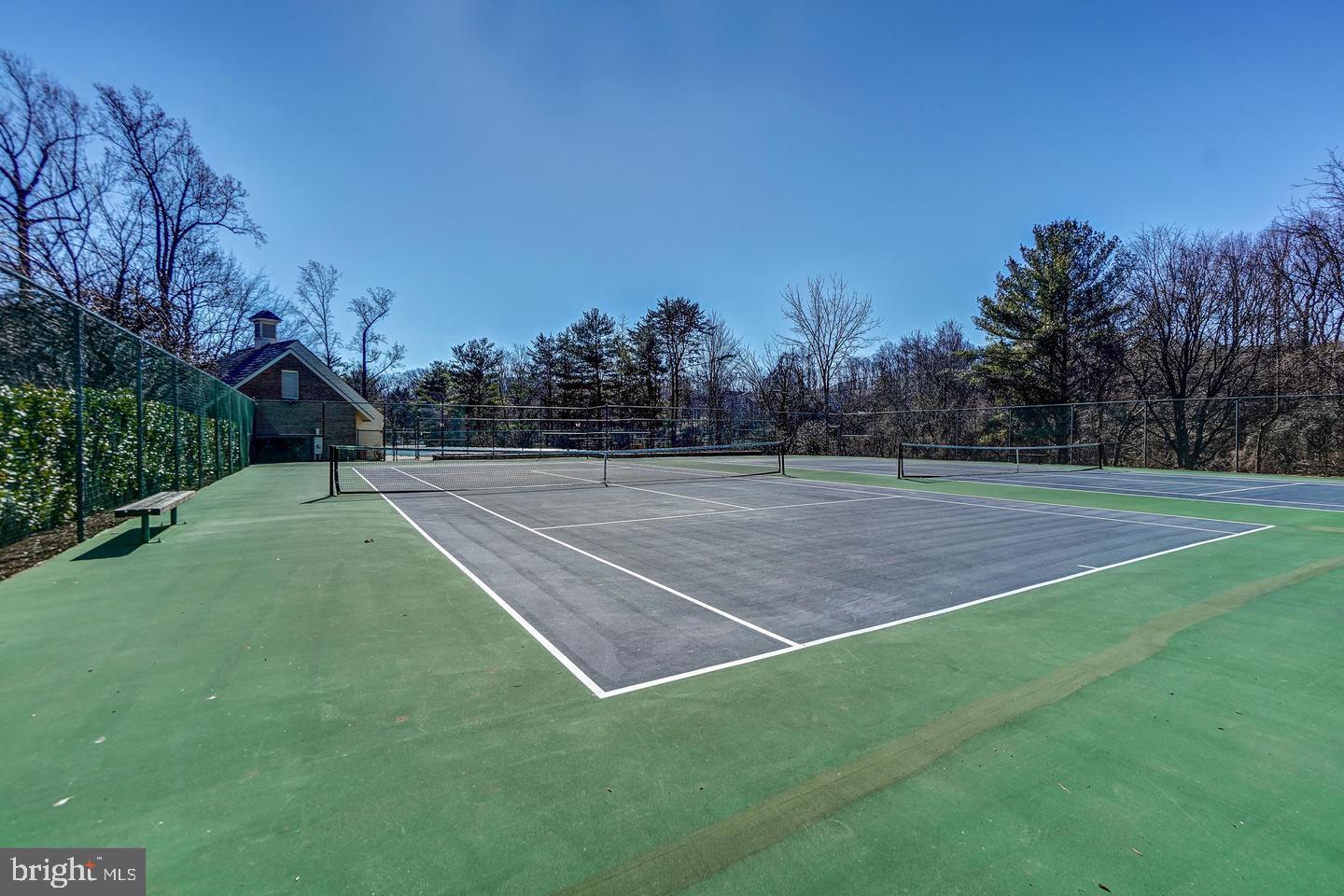 10706 Kings Riding Way, Unit 20118 Rockville, MD 20852 - Photo 22 of 24 a view of tennis court
