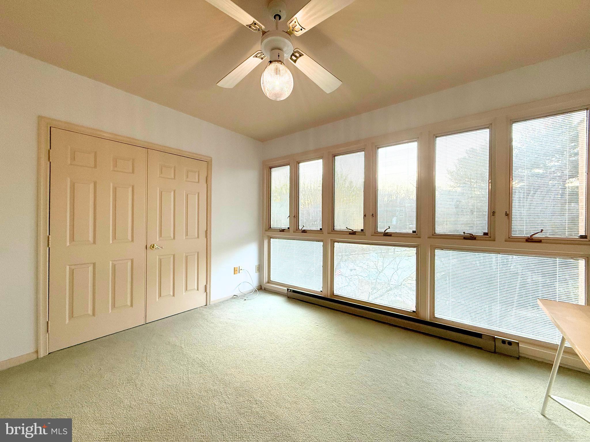 10706 Kings Riding Way, Unit 20118 Rockville, MD 20852 - Photo 9 of 24 a view of an empty room with a window