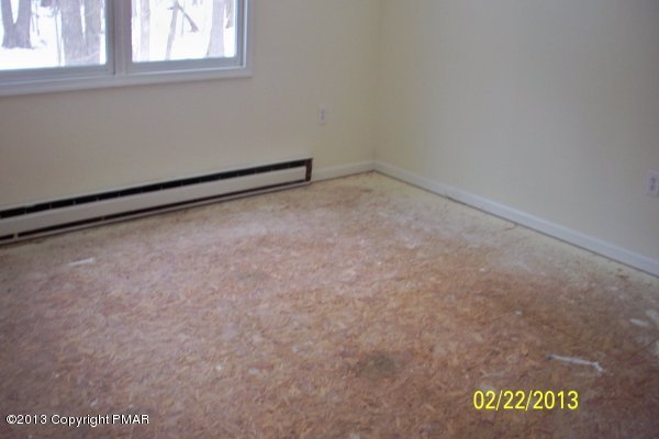 1109 Beechnut Road Effort, PA 18330 - Photo 6 of 8 a view of an empty room with a window