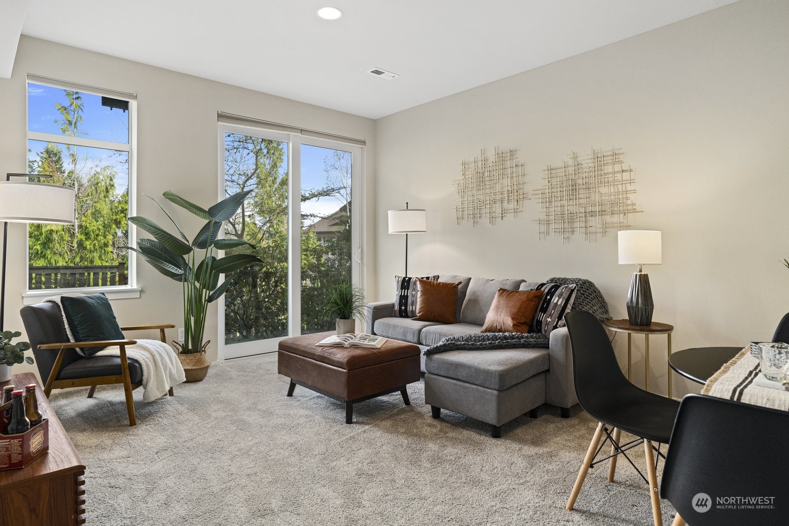 158 Cougar Ridge Road Northwest Issaquah, WA 98027 - Photo 23 of 39 a living room with furniture and a large window