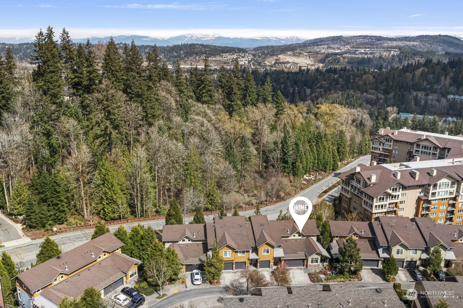 158 Cougar Ridge Road Northwest Issaquah, WA 98027 - Photo 34 of 39 a view of a city with mountains in the background