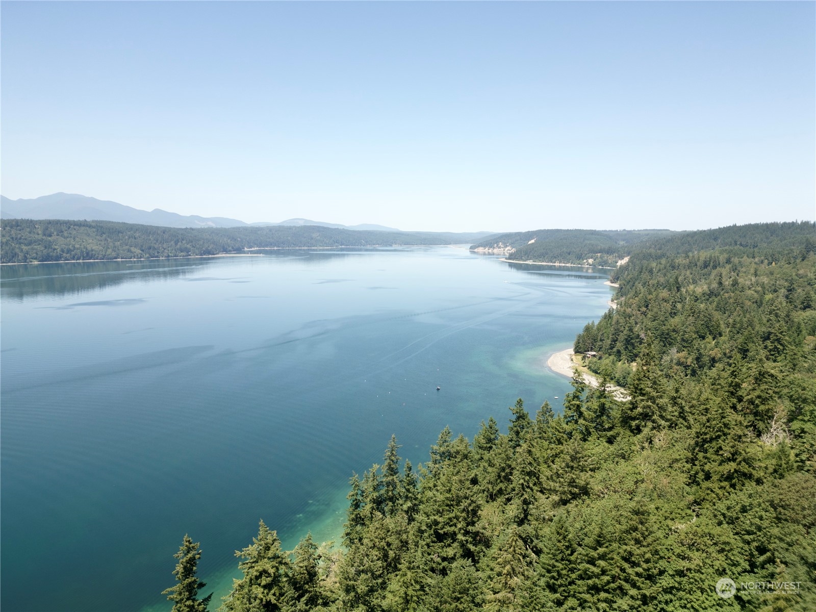 0 Rhododendron Drive Quilcene, WA 98376 - Photo 34 of 36 a view of a lake with a lake