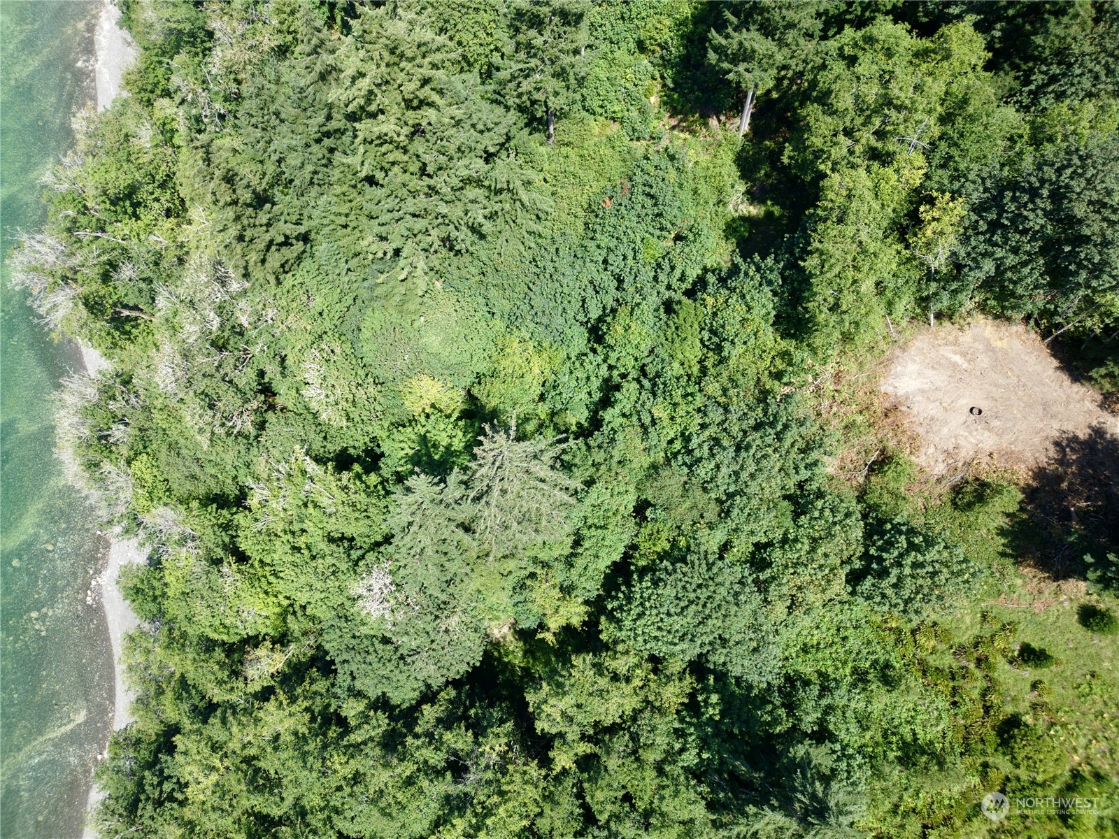 0 Rhododendron Drive Quilcene, WA 98376 - Photo 10 of 36 an aerial view of a house with a lush green forest