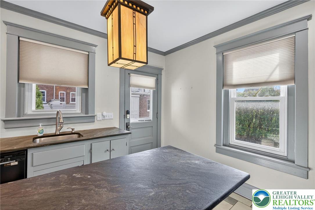 1036 Maple Street Bethlehem, PA 18018 - Photo 16 of 48 a bathroom with a sink and a mirror