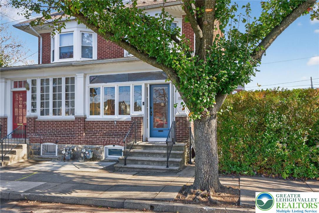 1036 Maple Street Bethlehem, PA 18018 - Photo 2 of 48 a front view of a house with a yard
