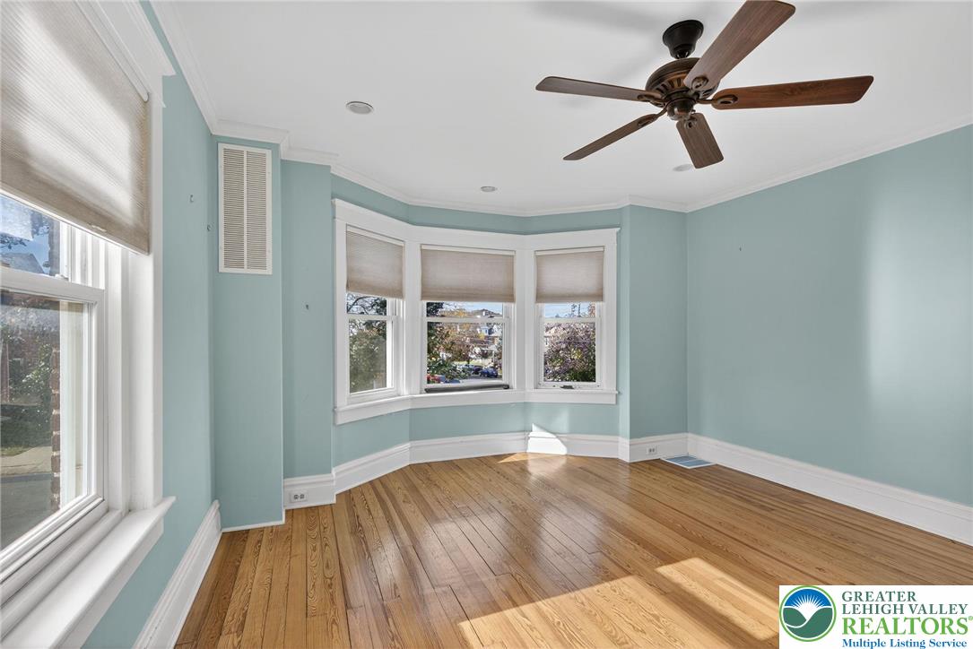 1036 Maple Street Bethlehem, PA 18018 - Photo 23 of 48 a view of empty room with wooden floor and fan