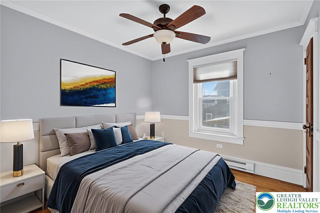 1036 Maple Street Bethlehem, PA 18018 - Photo 25 of 48 a bedroom with a bed and a painting on the wall