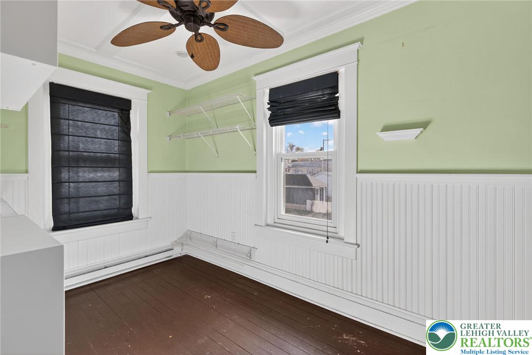 1036 Maple Street Bethlehem, PA 18018 - Photo 26 of 48 a view of an empty room with a window and a ceiling fan