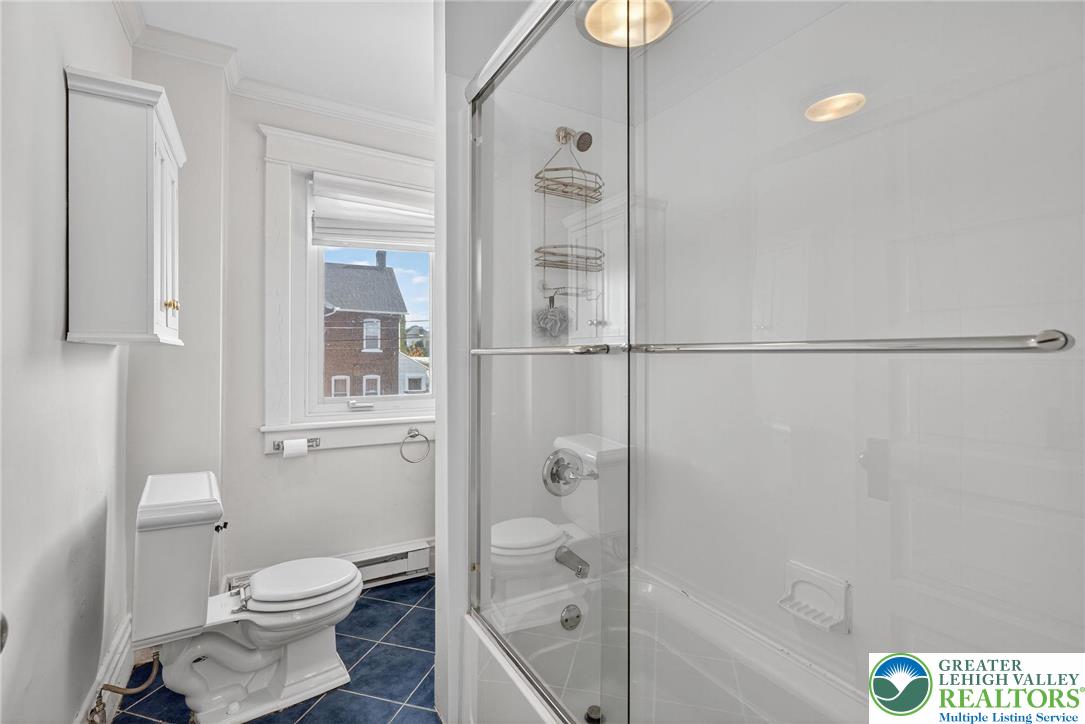 1036 Maple Street Bethlehem, PA 18018 - Photo 28 of 48 a bathroom with a toilet and a shower