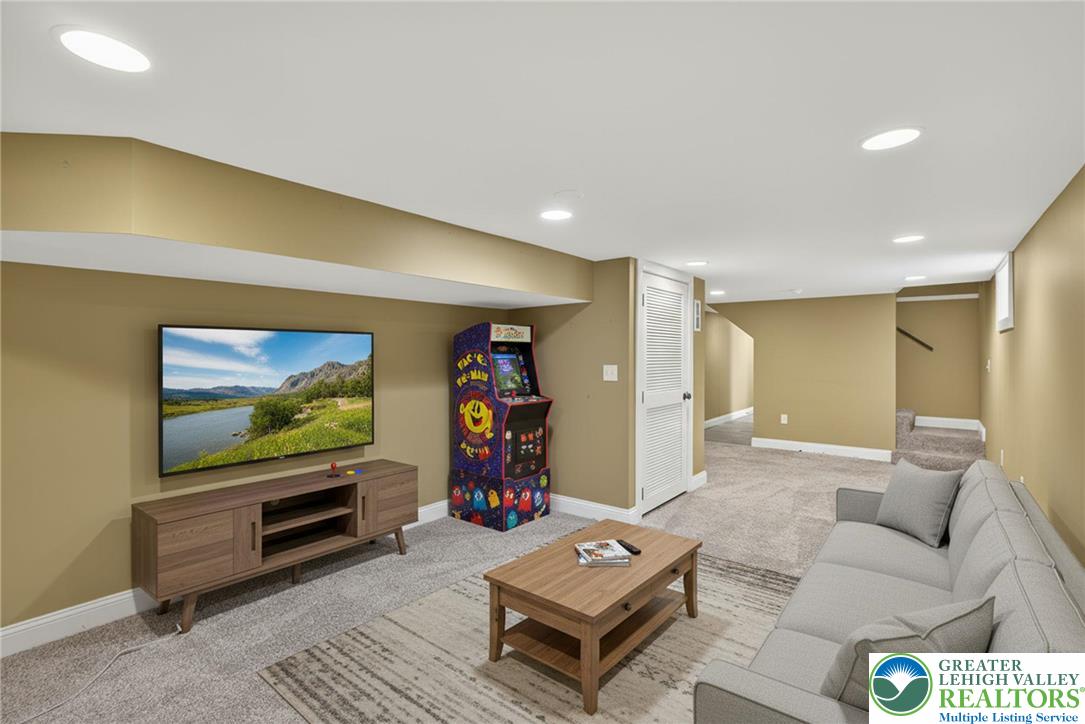 1036 Maple Street Bethlehem, PA 18018 - Photo 36 of 48 a living room with furniture and a flat screen tv