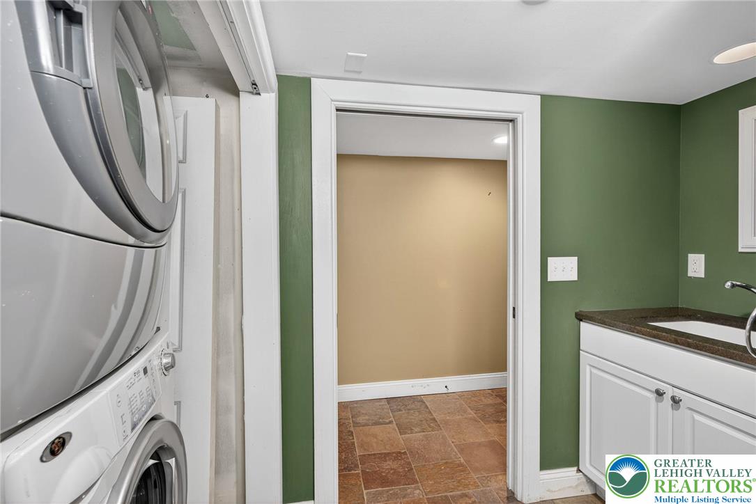 1036 Maple Street Bethlehem, PA 18018 - Photo 38 of 48 a view of a storage & utility room with a washer dryer