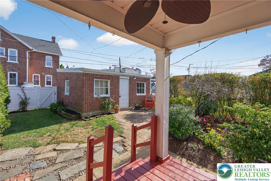 1036 Maple Street Bethlehem, PA 18018 - Photo 42 of 48 a view of a patio with table and chairs and potted plants