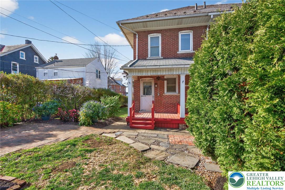 1036 Maple Street Bethlehem, PA 18018 - Photo 44 of 48 a front view of a house with a yard