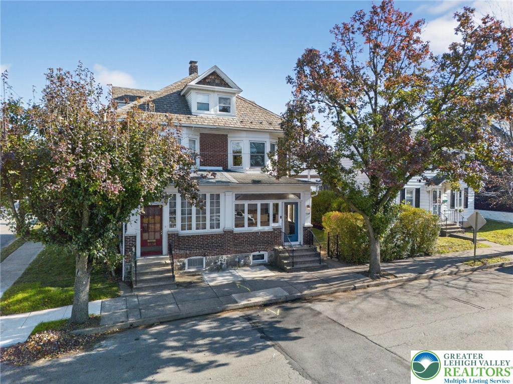 1036 Maple Street Bethlehem, PA 18018 - Photo 46 of 48 a front view of a house with a yard