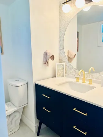 a bathroom with a sink and a toilet