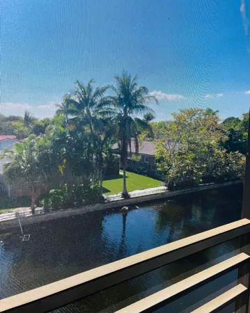 a view of swimming pool with a yard