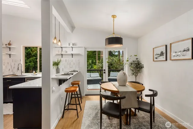 a dining room with furniture window wooden floor