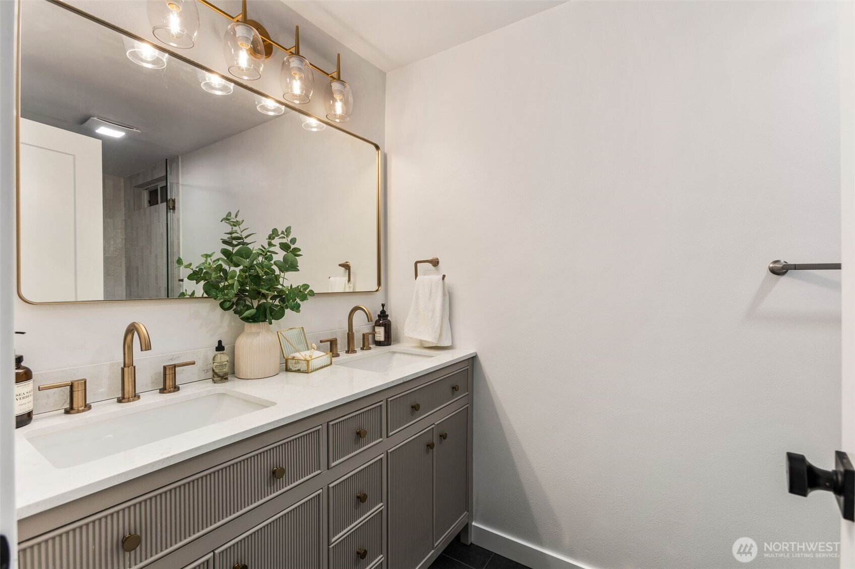 20201 45th Drive Southeast Bothell, WA 98012 - Photo 15 of 38 a bathroom with a sink and a mirror