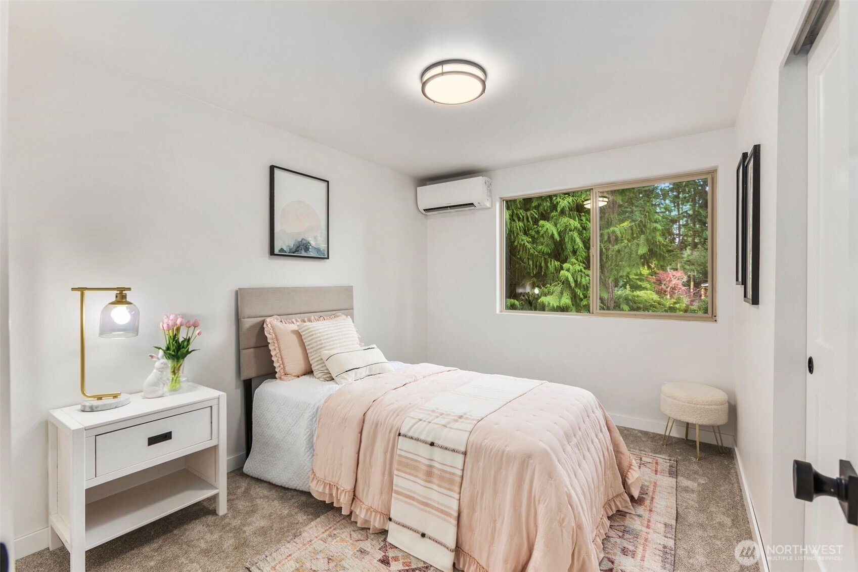 20201 45th Drive Southeast Bothell, WA 98012 - Photo 19 of 38 a bedroom with a bed and a window