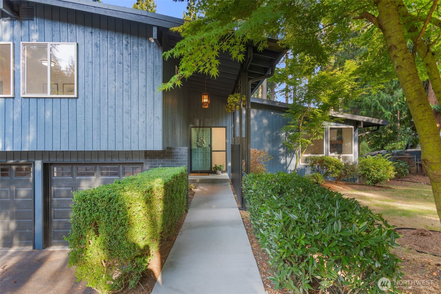 20201 45th Drive Southeast Bothell, WA 98012 - Photo 3 of 38 a view of a pathway along the house