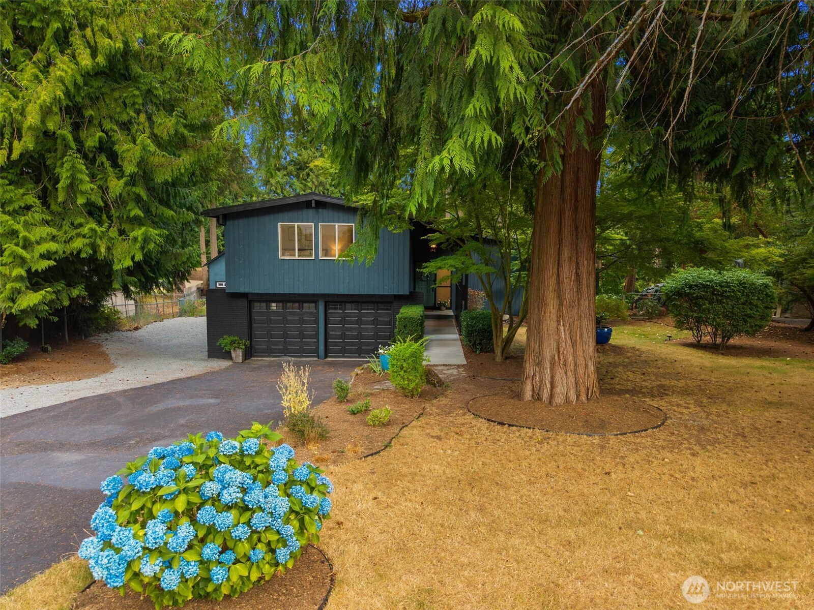 20201 45th Drive Southeast Bothell, WA 98012 - Photo 36 of 38 a front view of a house with garden