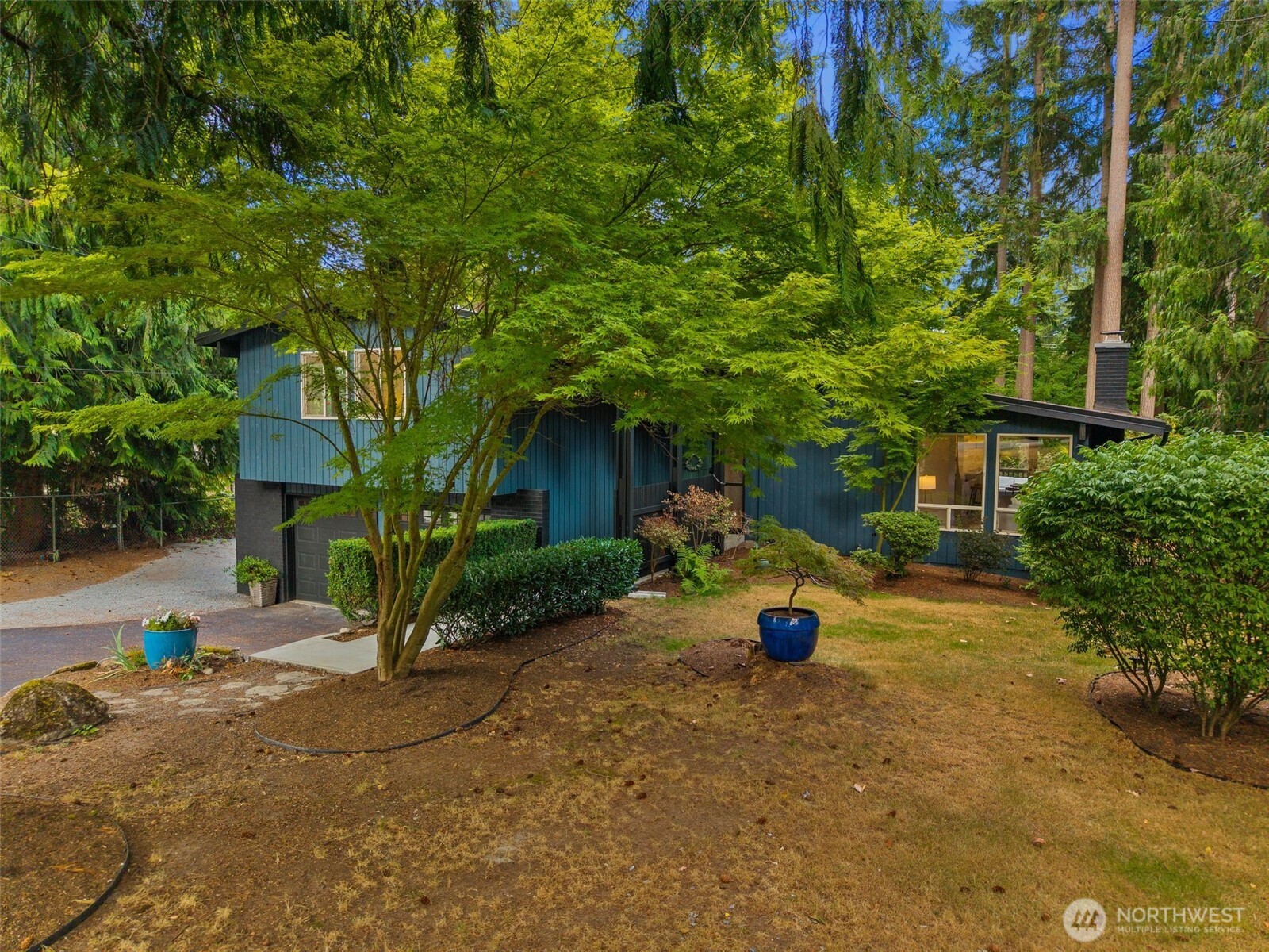 20201 45th Drive Southeast Bothell, WA 98012 - Photo 37 of 38 a view of a house with backyard and tree