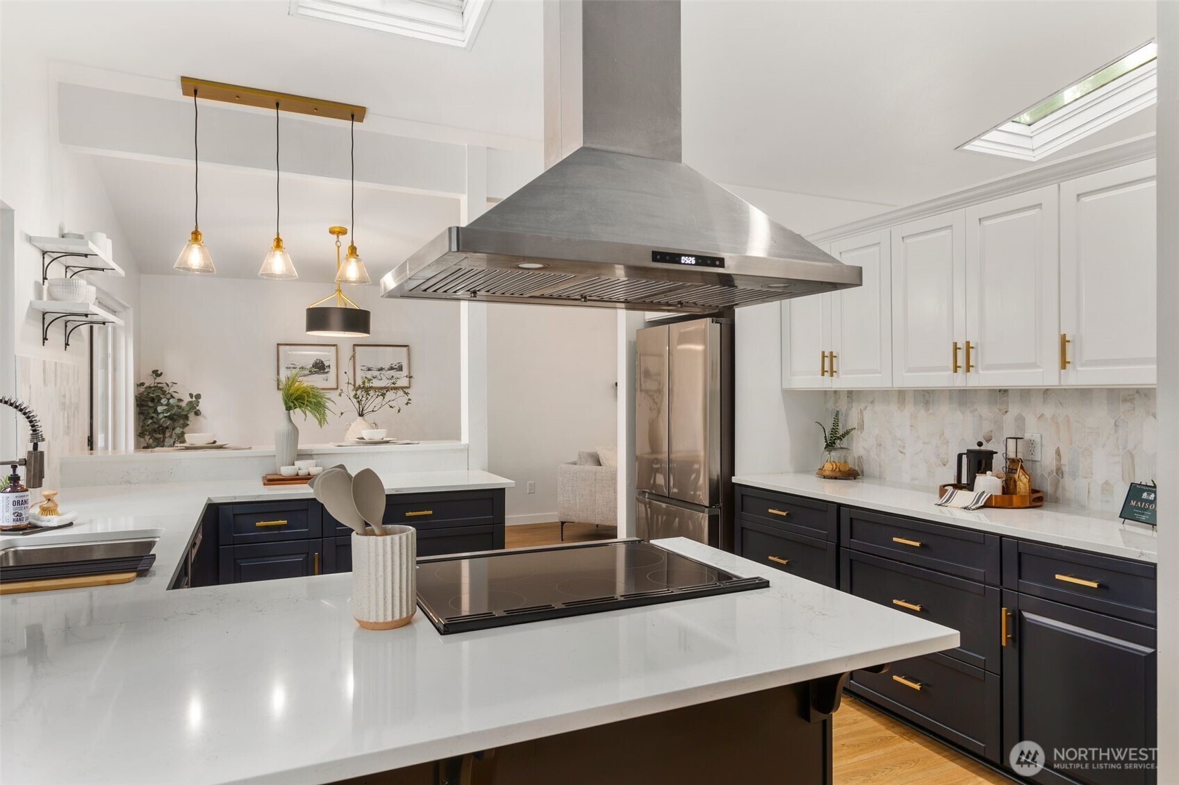 20201 45th Drive Southeast Bothell, WA 98012 - Photo 4 of 38 a kitchen with stainless steel appliances a sink a stove and a refrigerator