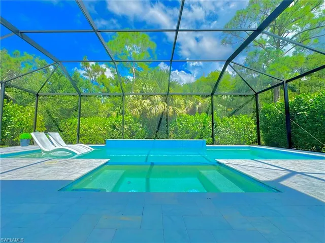 a view of yard with a small pool